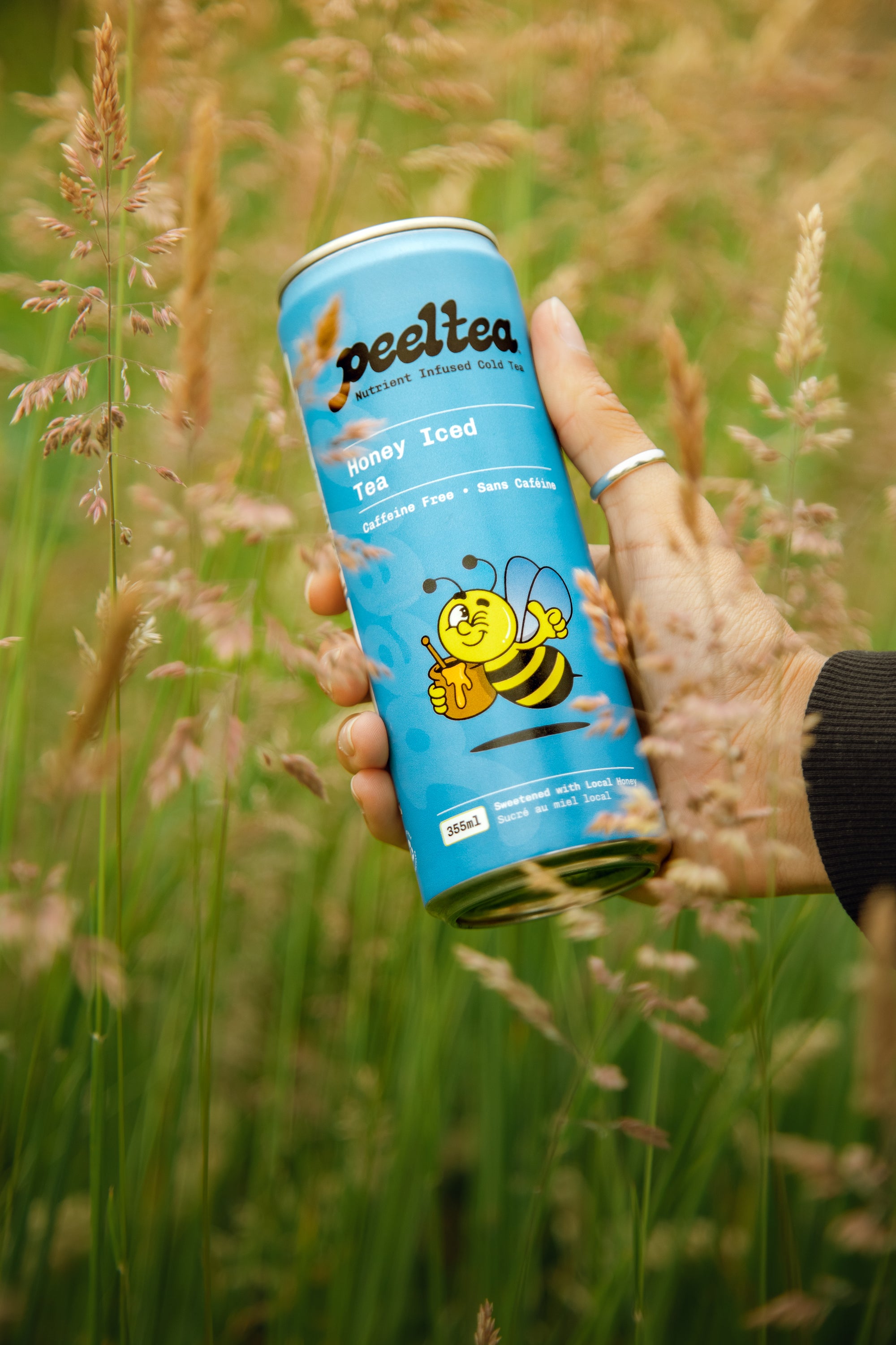 Close-up of PeelTea Honey Iced Tea nutrient-infused cold tea can.